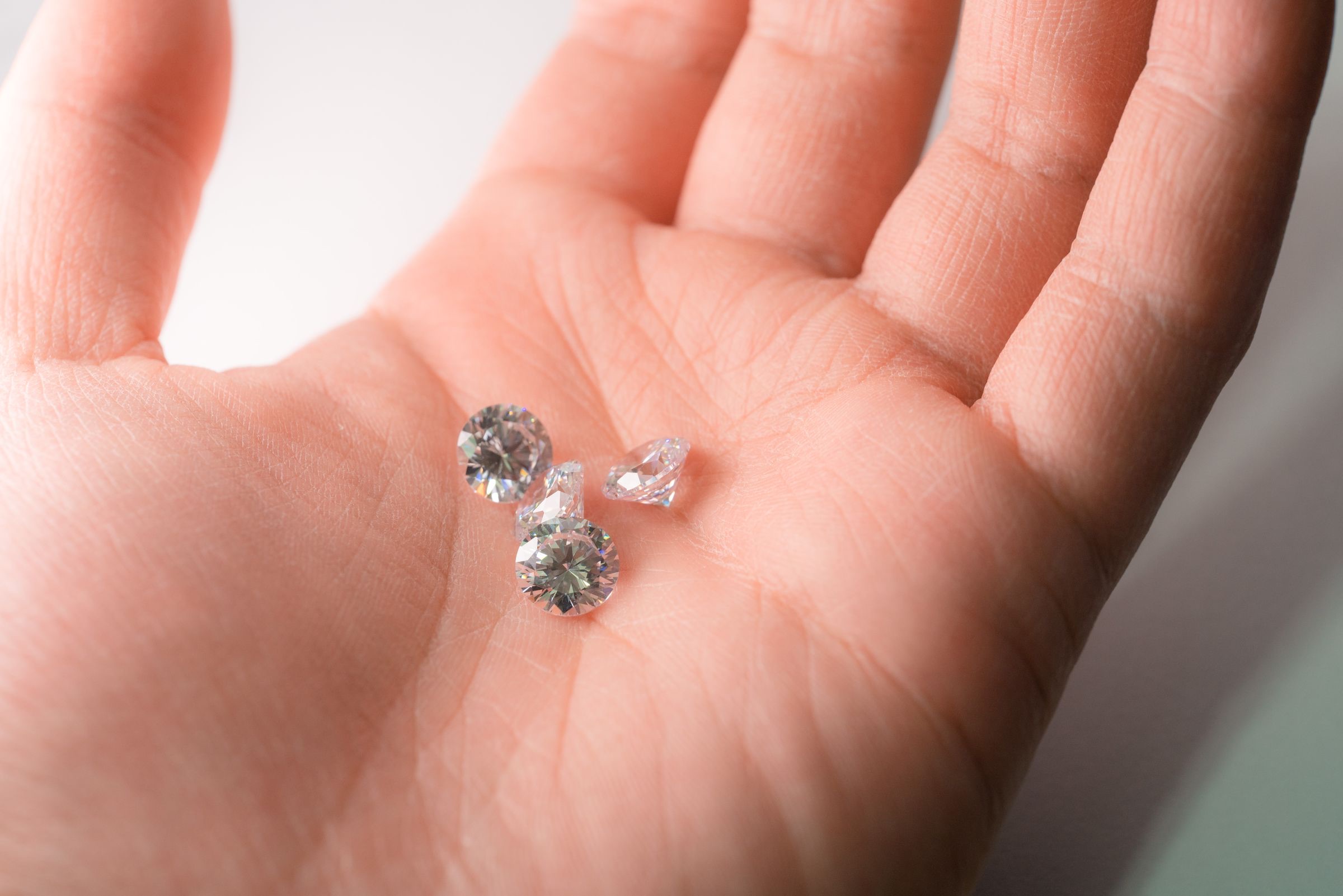Rough and polished diamonds side by side